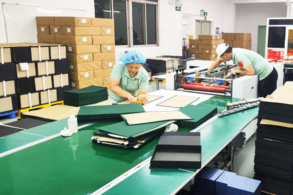 Cutting board for laminated boxes at a factory in China